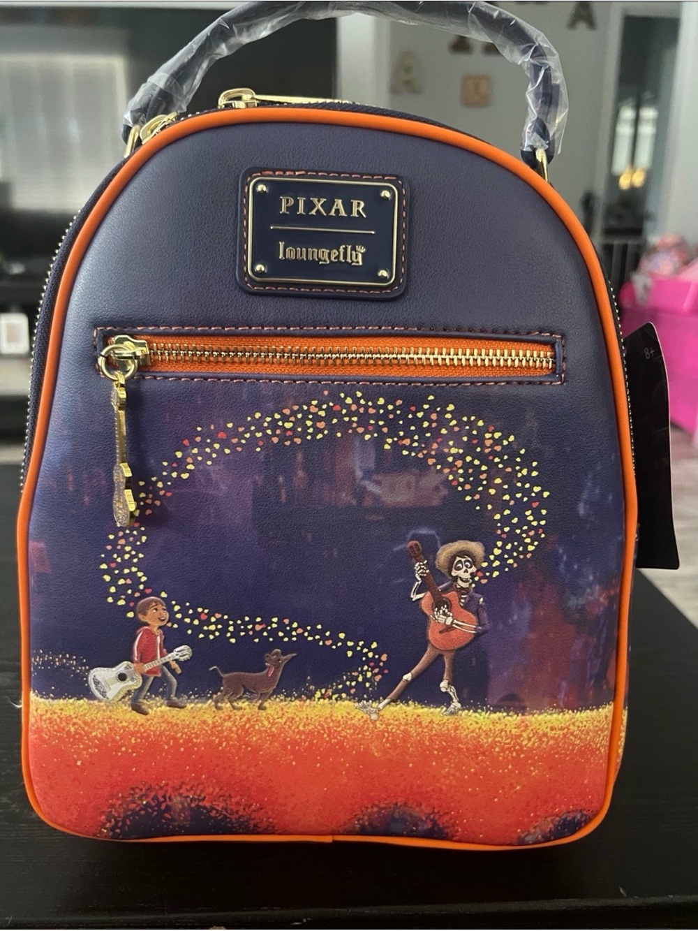 Loungefly Pixar Coco Navy and Orange Mini Backpack